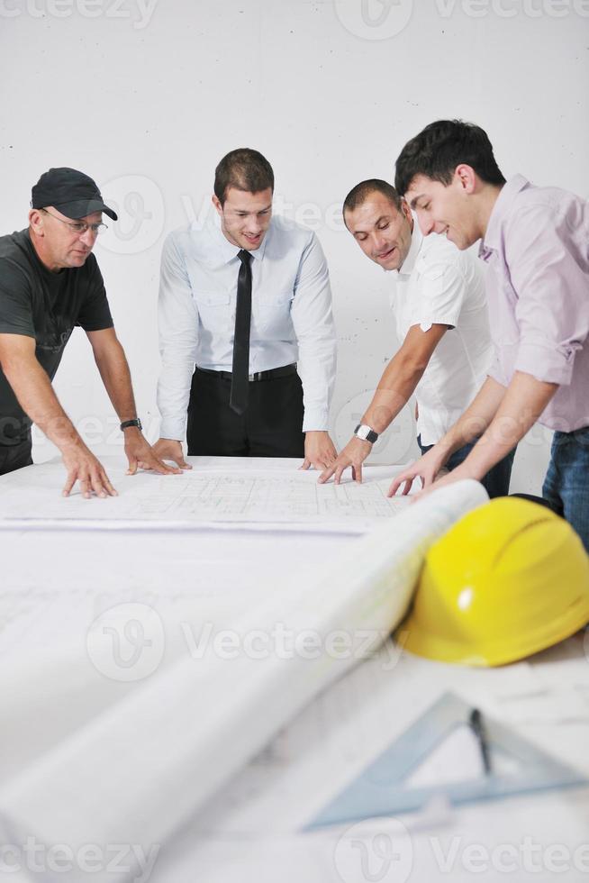 Team of architects on construciton site photo