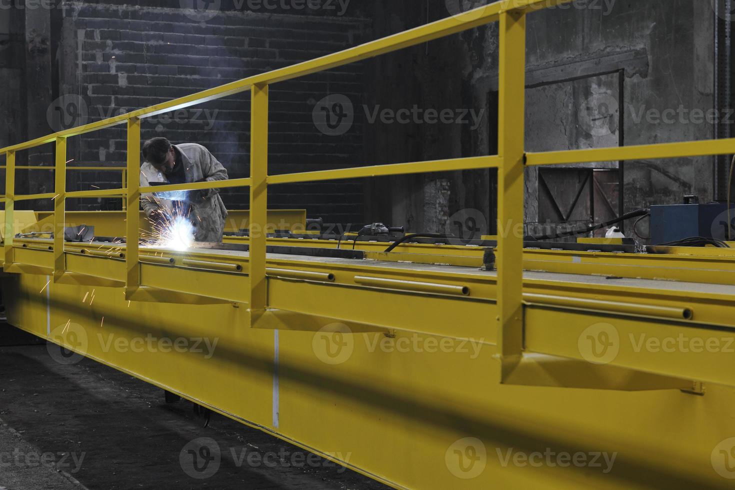 Welder in factory photo