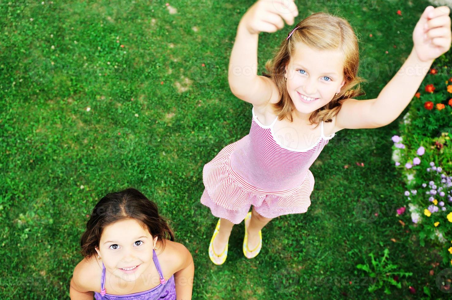 two happy girls have fun outdoor photo