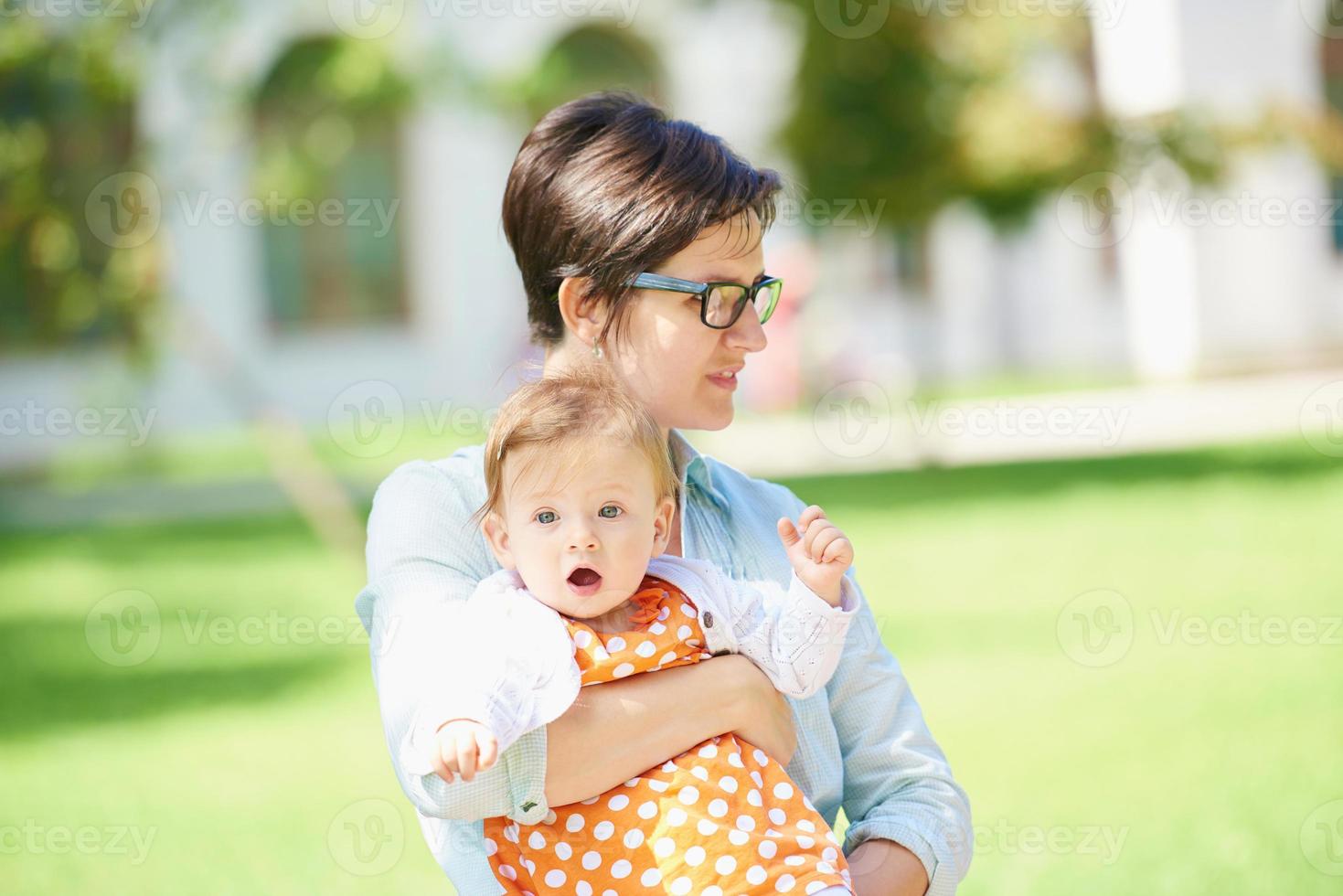 mom and baby in nature photo