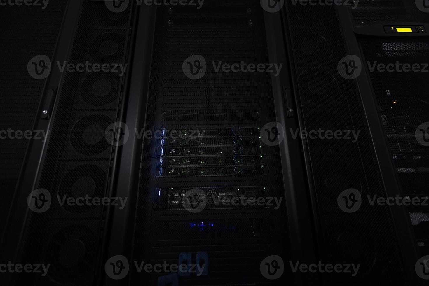 Data Center With Multiple Rows of Fully Operational Server Racks. Modern Telecommunications, Cloud Computing, Artificial Intelligence, Database, Supercomputer Technology Concept. photo