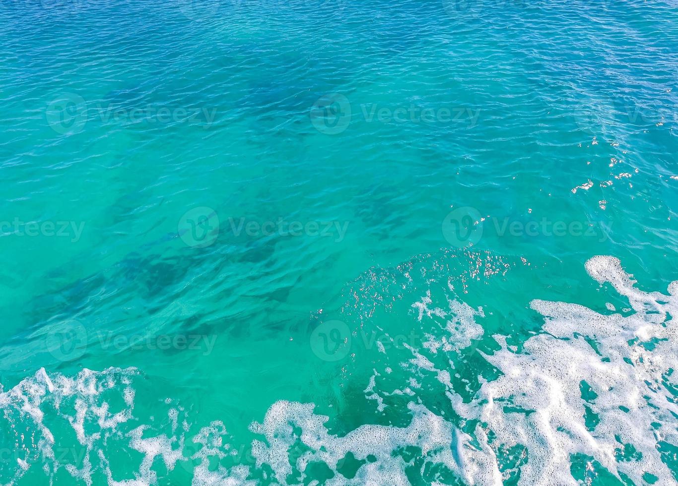 Blue turquoise water waves ocean and sea texture pattern Mexico. photo