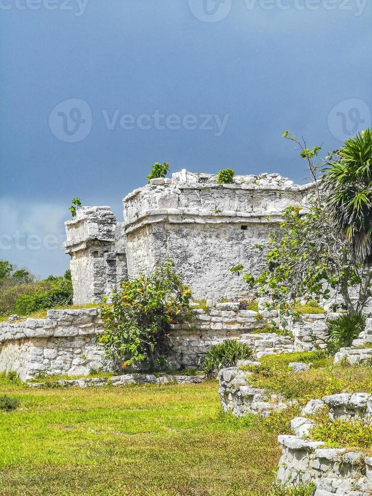 Ancient Tulum ruins Mayan site temple pyramids artifacts seascape Mexico. photo