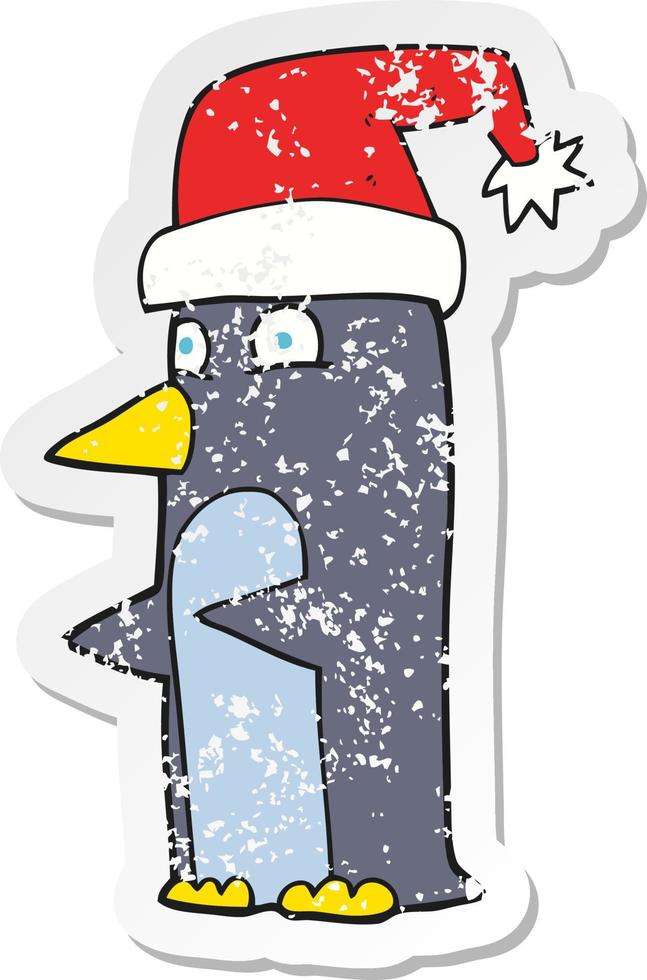 retro distressed sticker of a cartoon christmas penguin vector