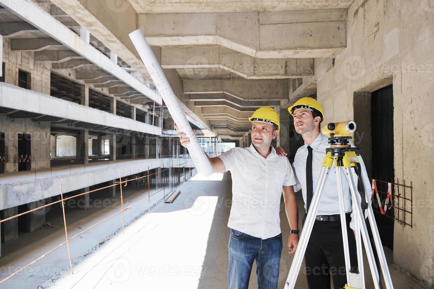 Team of architects on construciton site photo