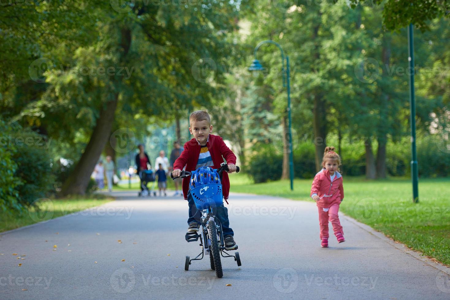 boy and girl with bicycle photo