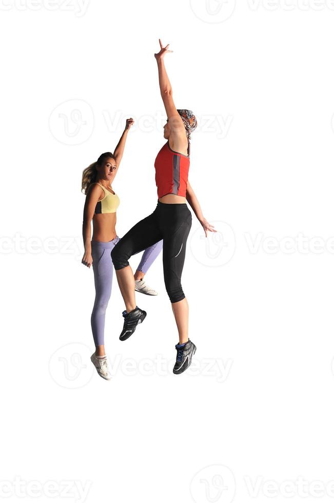 two womans work out and jumping photo