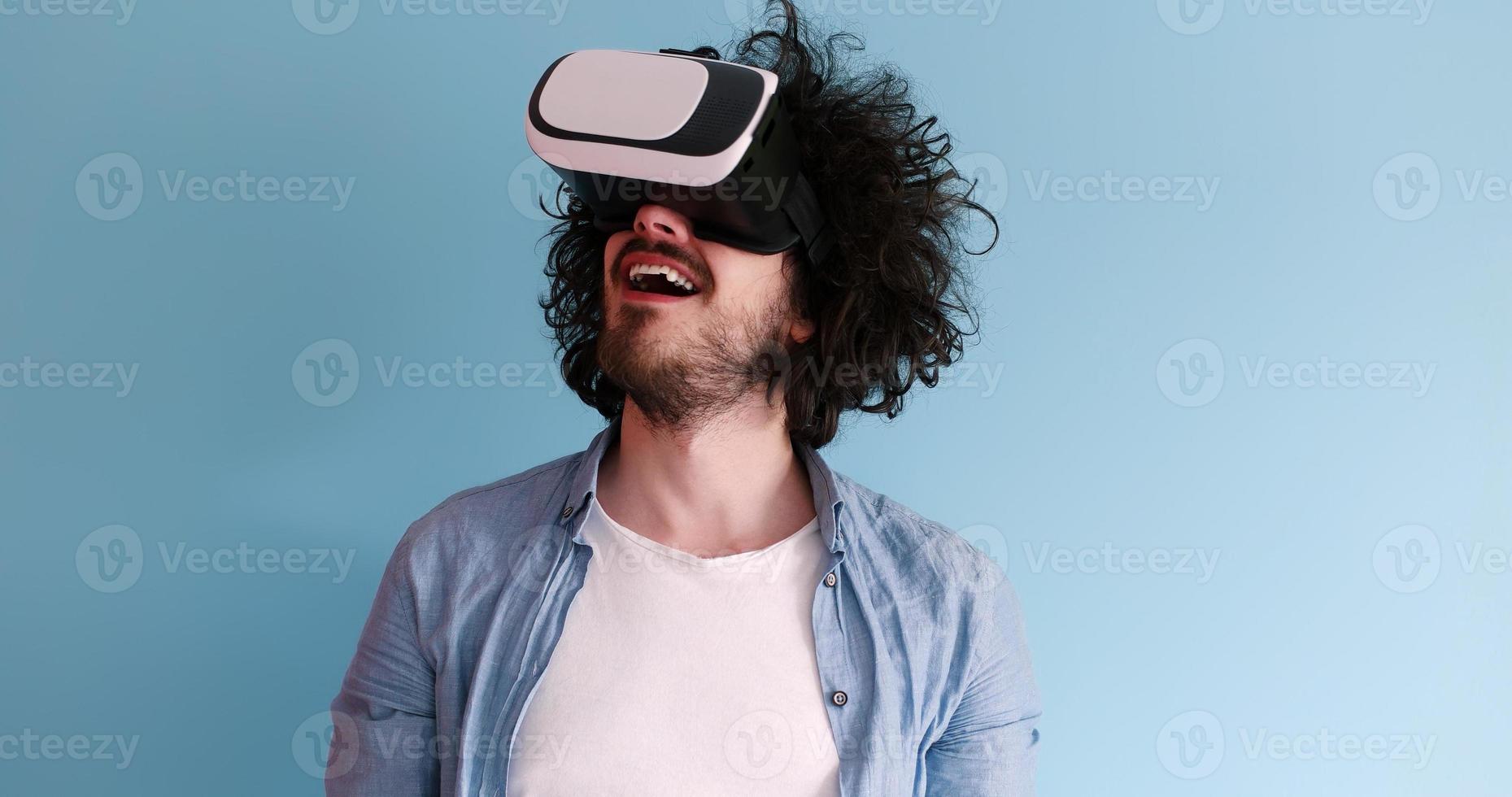man using VR headset glasses of virtual reality photo