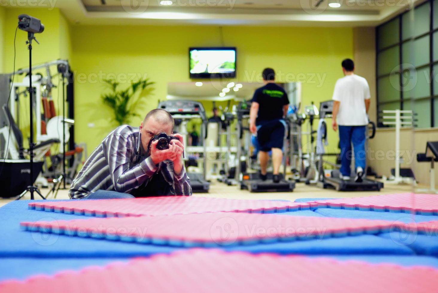 Photographer in gym photo