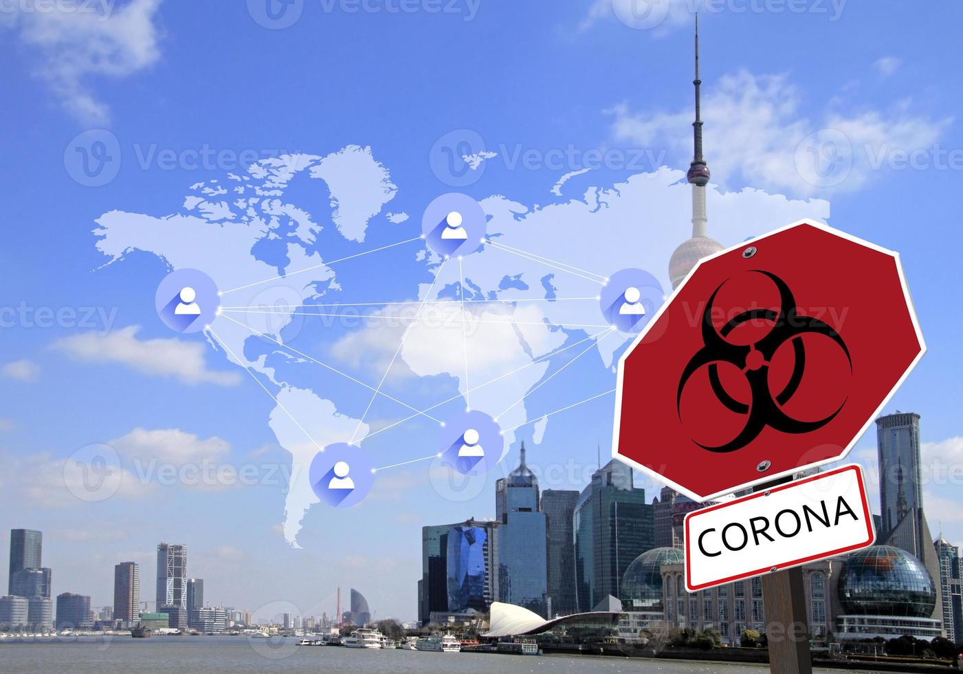 Coronavirus warning sign over the skyline of Shanghai and a global network diagram photo