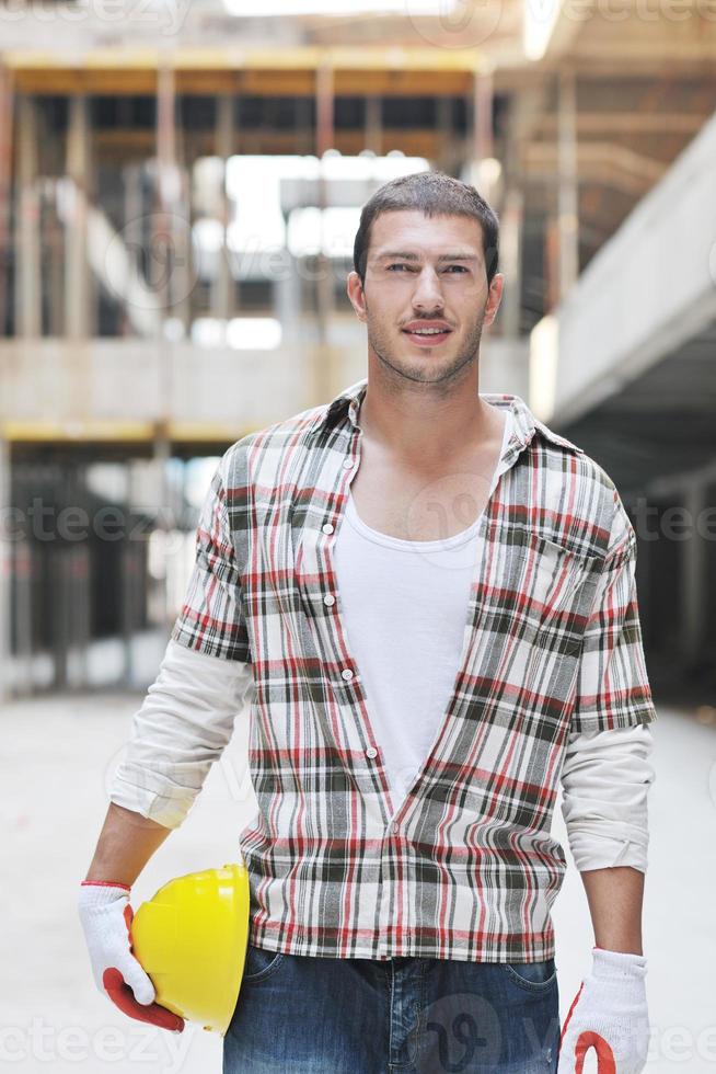 hard worker on construction site photo