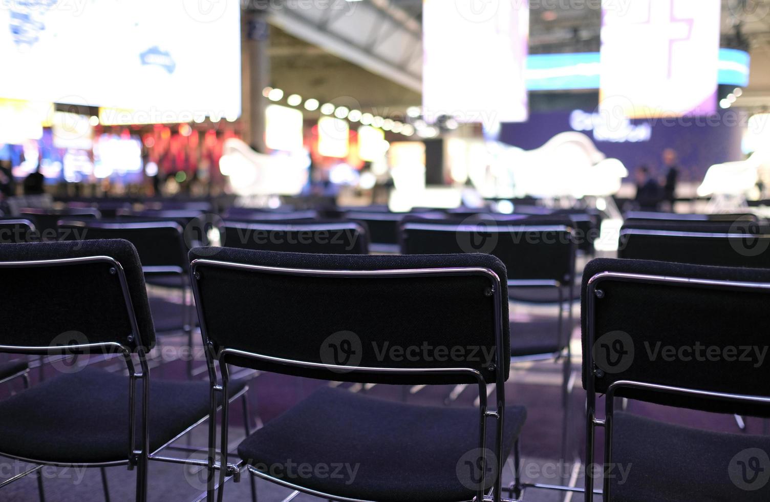 Empty seats waiting for the conference session to start photo