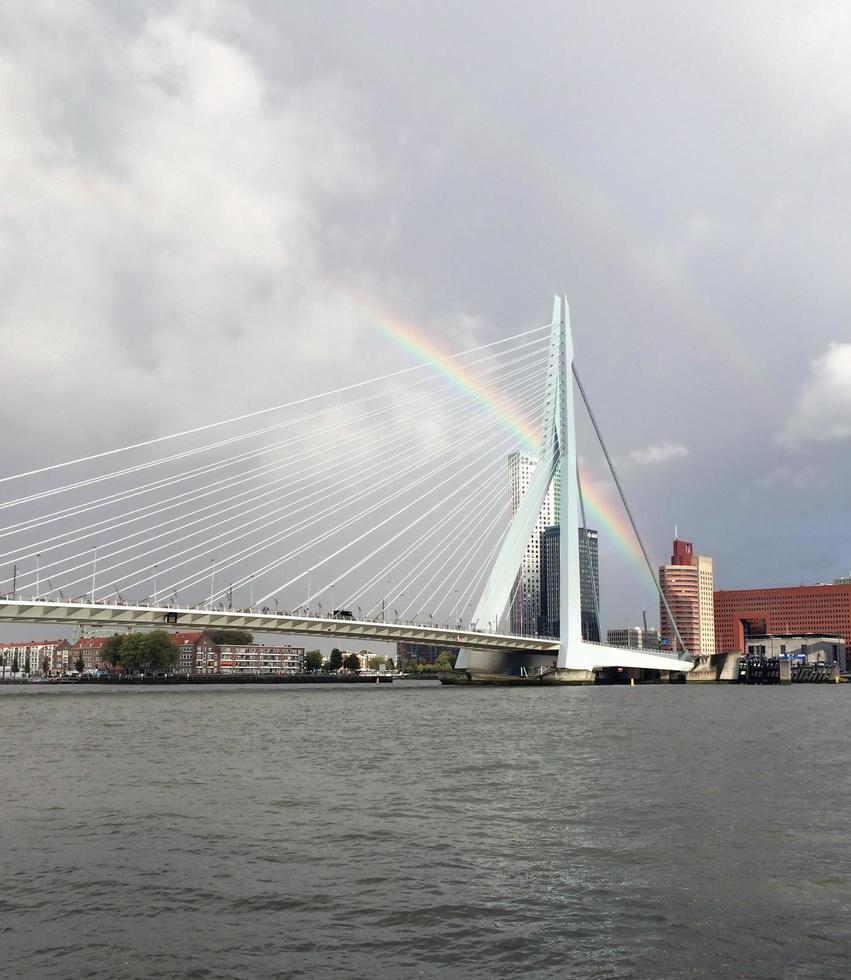 Rotterdam, South Holland, Netherlands, 2019 - A big rainbow spans over the city of Rotterdam, Netherlands photo