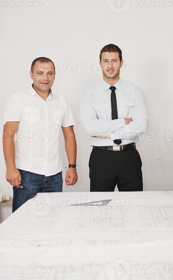 Team of architects on construciton site photo