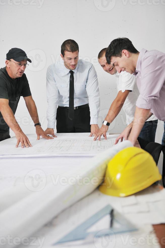 Team of architects on construciton site photo