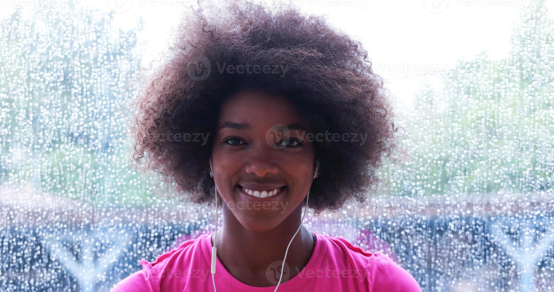 portrait of young afro american woman in gym photo