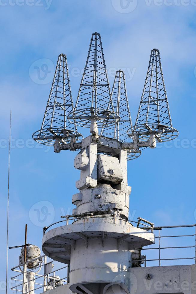 Mast of ship with navigation equipment, bottom view photo