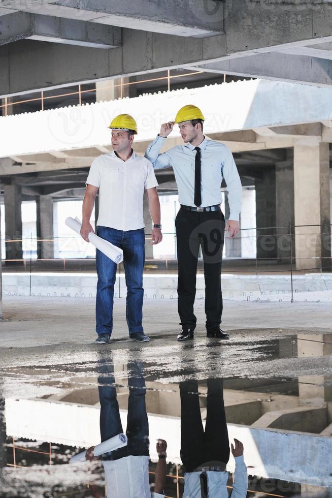 Team of architects on construciton site photo