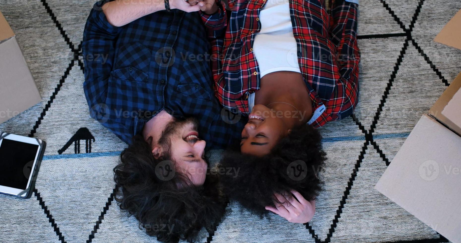 Top view of attractive young multiethnic couple photo