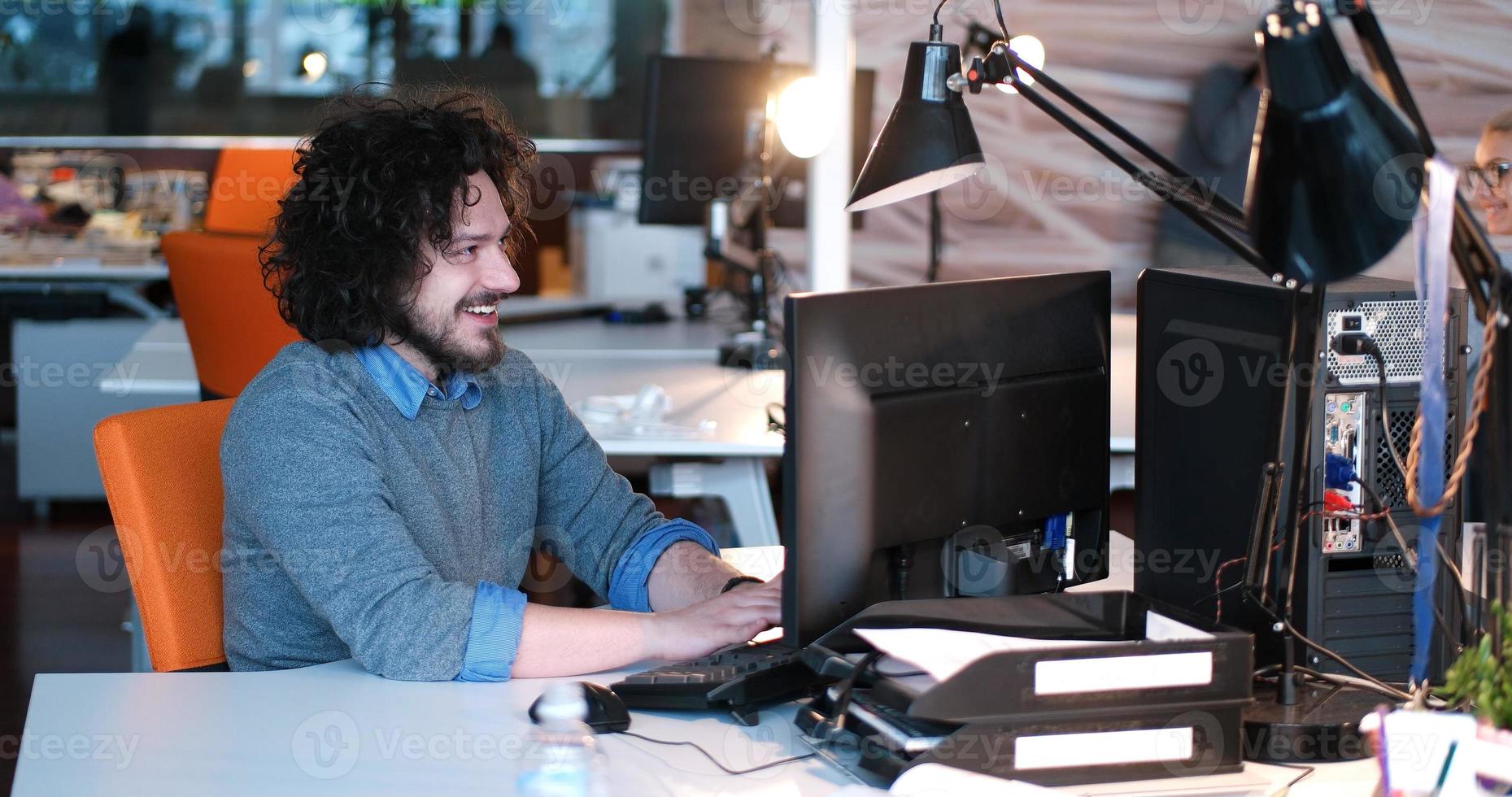 businessman working using a computer in startup office photo