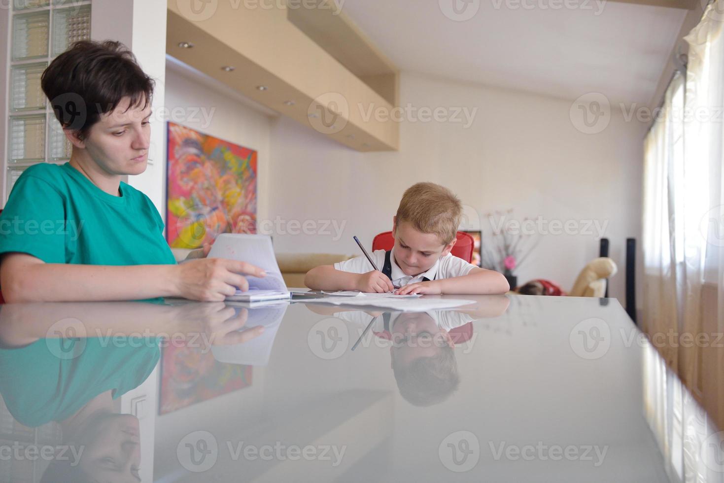 Boy doing homework photo