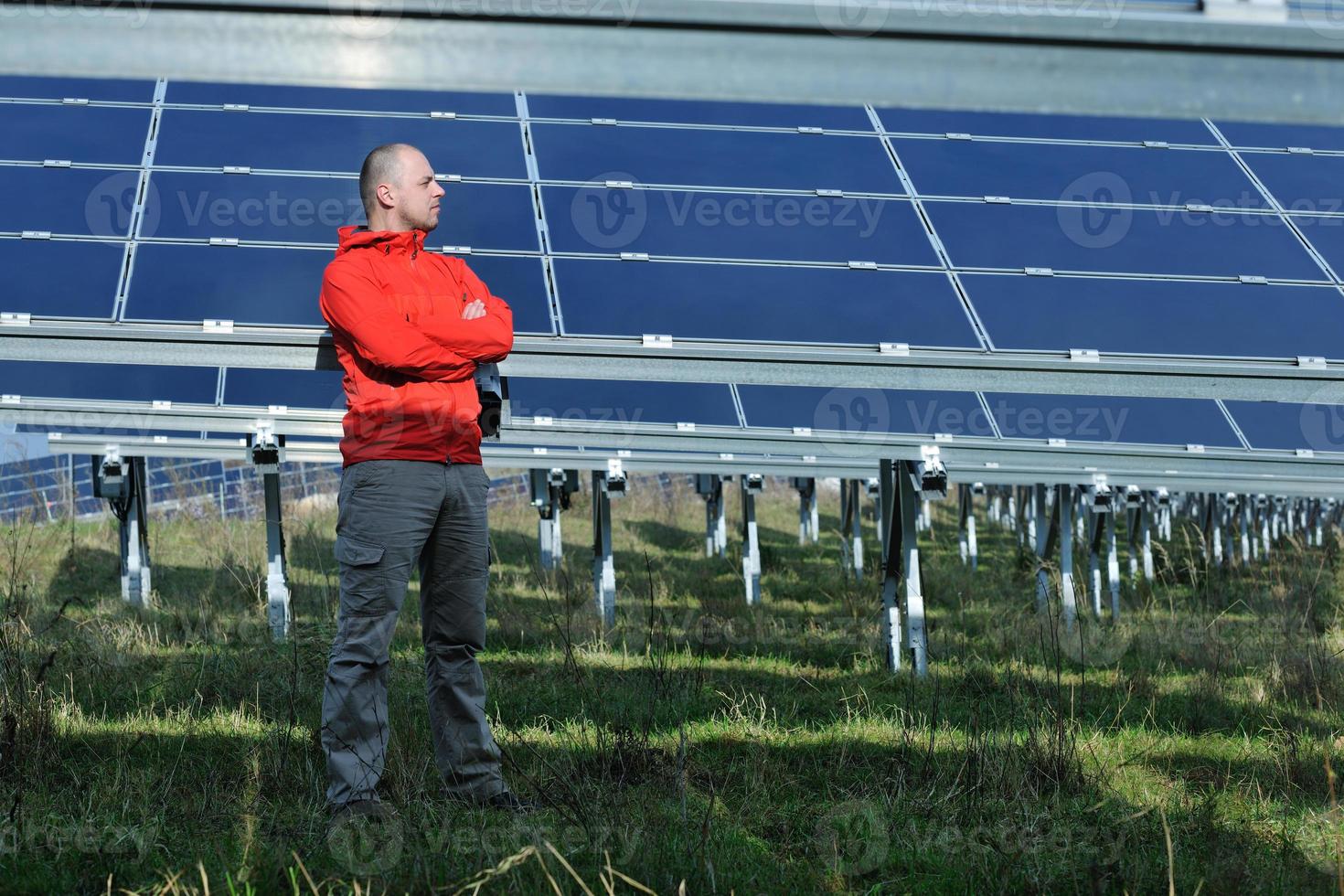 Male solar panel engineer at work place photo