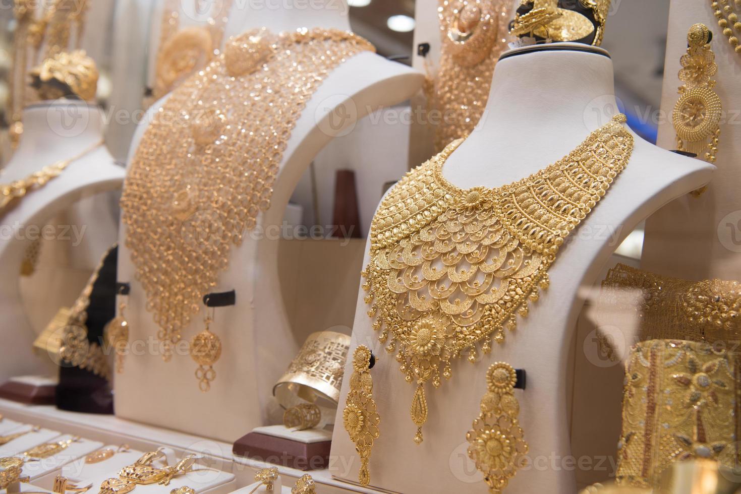 gold jewelry in the shop window photo