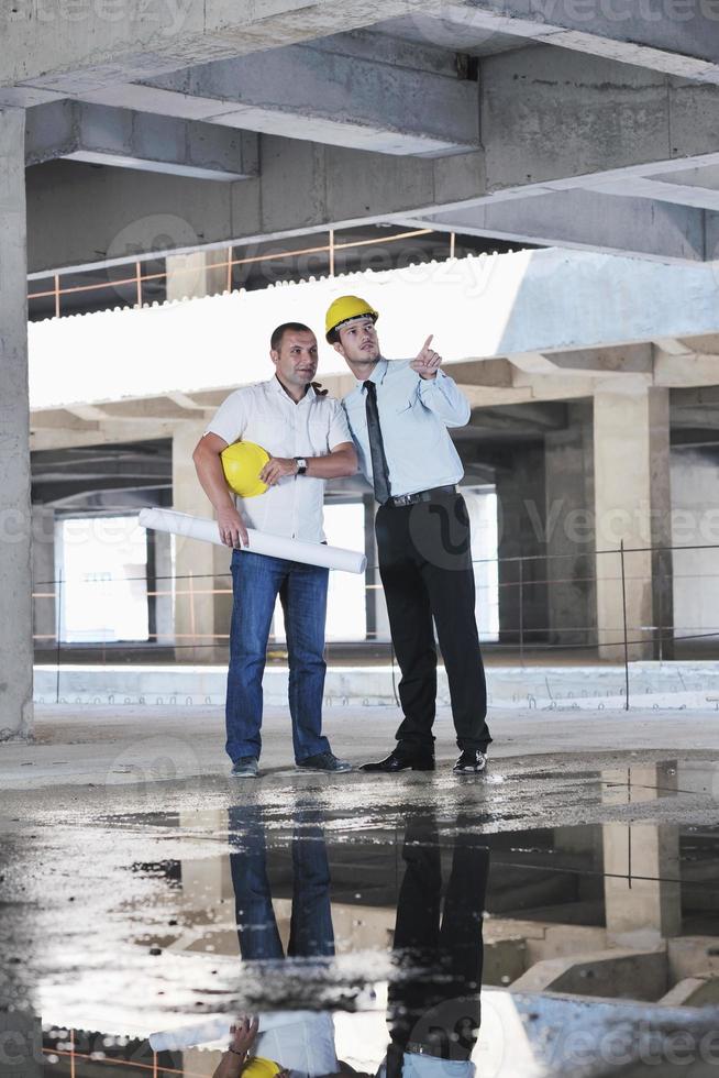 Team of architects on construciton site photo