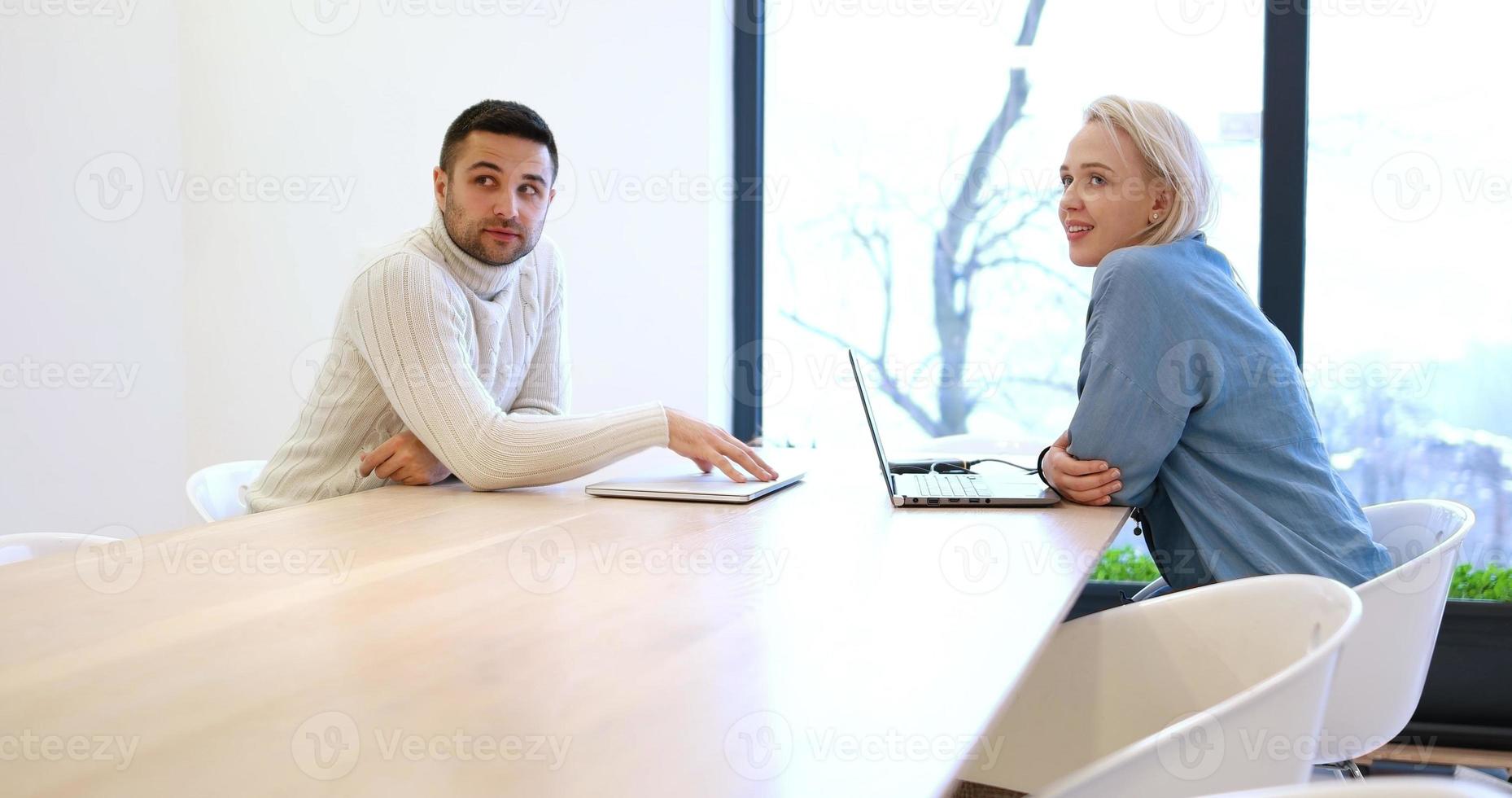 Startup Business Team At A Meeting at modern office building photo