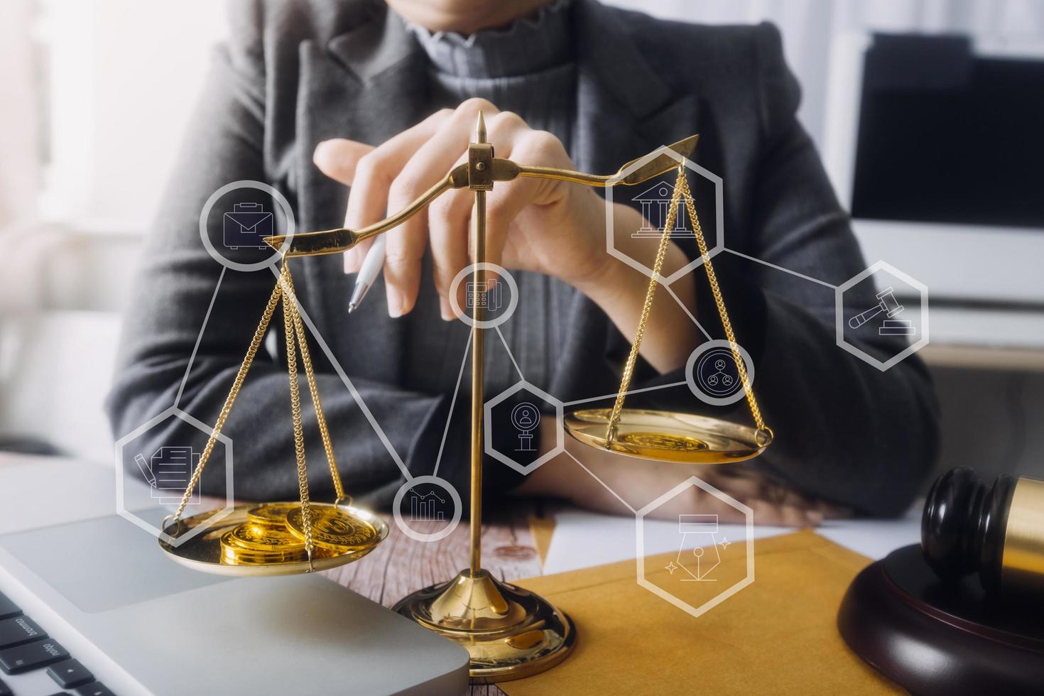 Business and lawyers discussing contract papers with brass scale on desk in office. Law, legal services, advice, justice and law concept picture with film grain effect photo