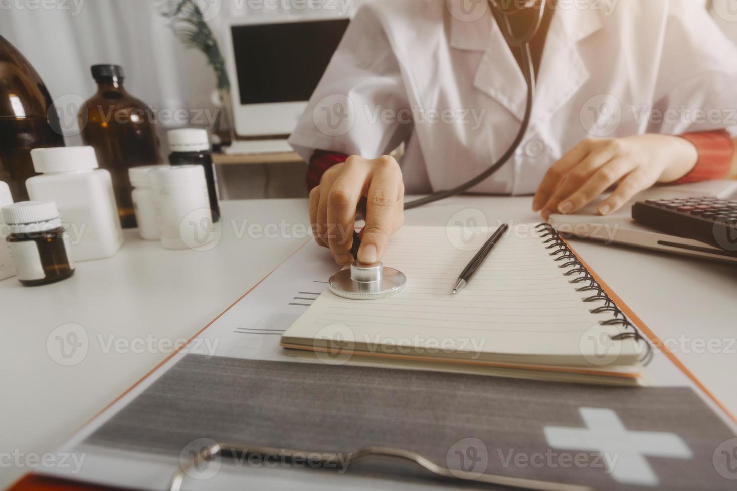 Medicine doctor and stethoscope touching icon medical network connection with modern interface on digital tablet in hospital background. Medical technology network concept photo
