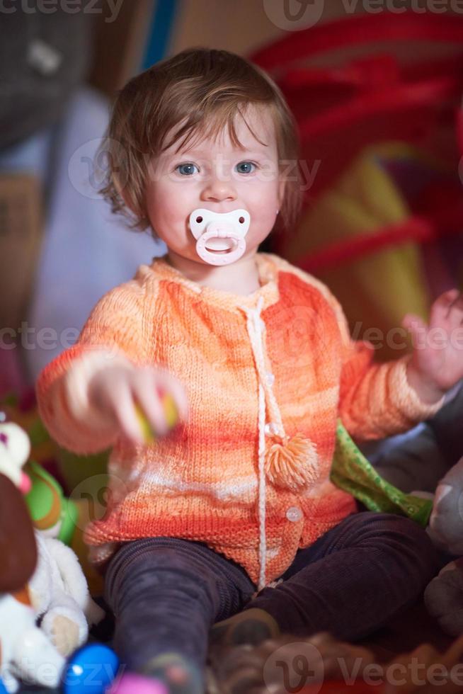 child playing with toys  at home photo