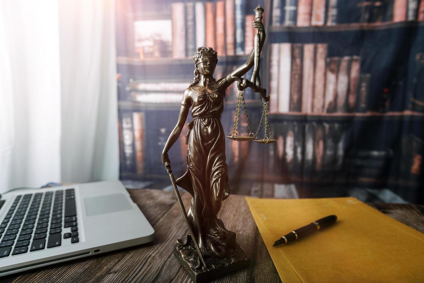 Business and lawyers discussing contract papers with brass scale on desk in office. Law, legal services, advice, justice and law concept picture with film grain effect photo
