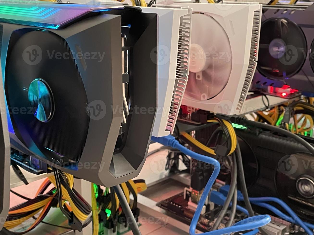 Row of bitcoin miners set up on the wired shelfs. Device for mining crypto currency. Mining cryptocurrency. Bitcoin farm. Machines for mining cryptocurrency bitcoin. Electronic device at day. photo