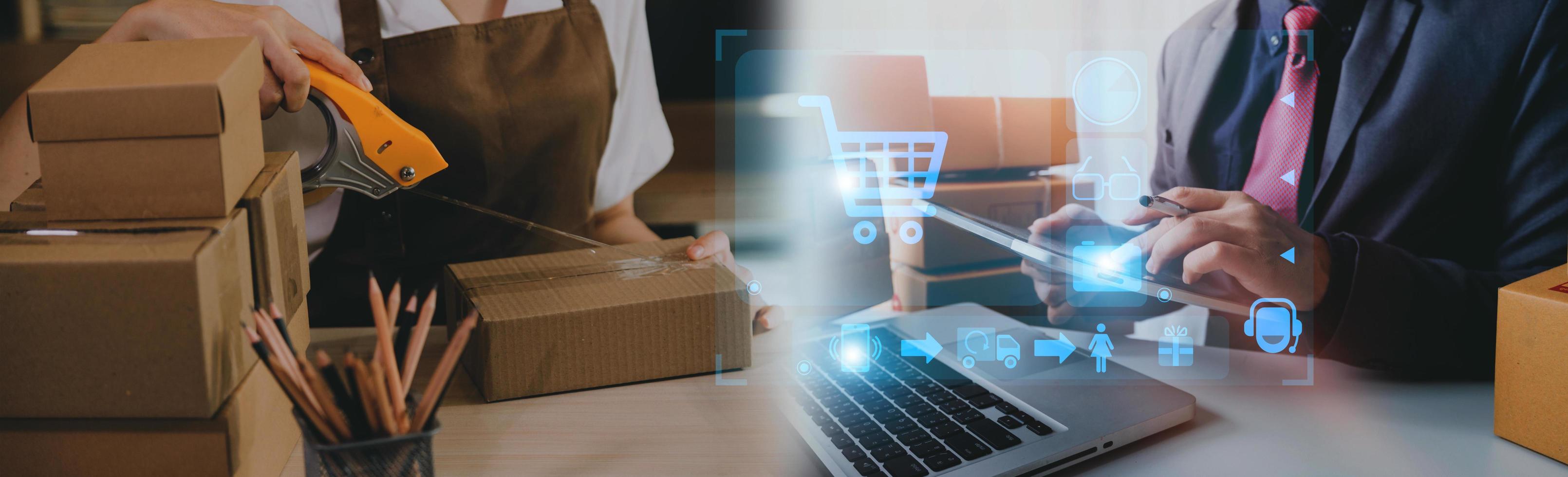 Startup small business entrepreneur or freelance Asian woman using a laptop with box, Young success Asian woman with her hand lift up, online marketing packaging box and delivery, SME concept. photo