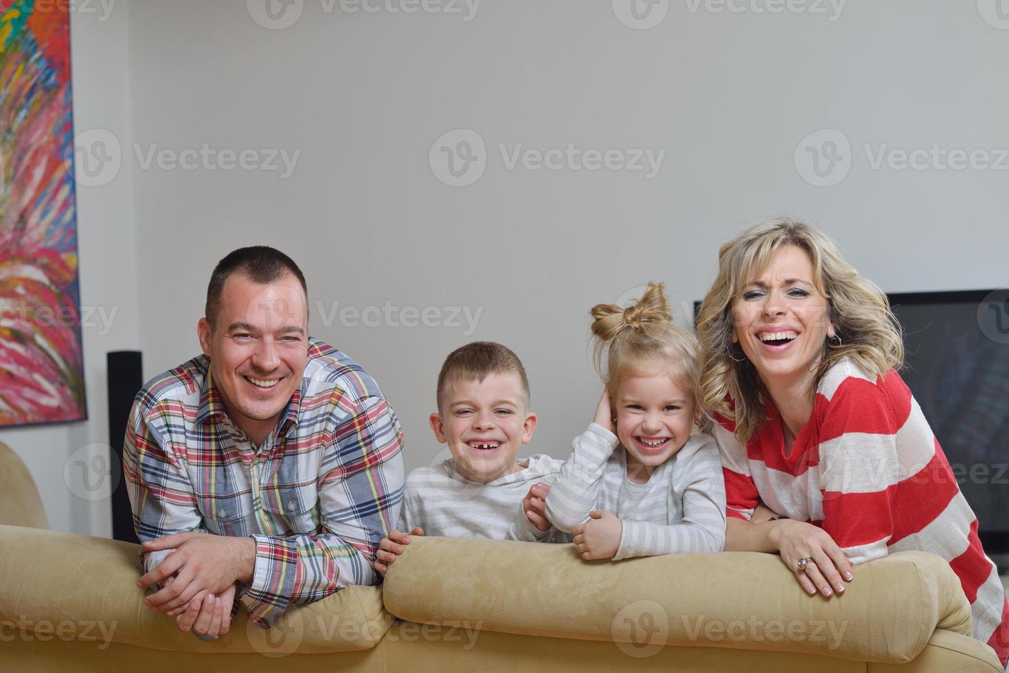 happy young family at home photo