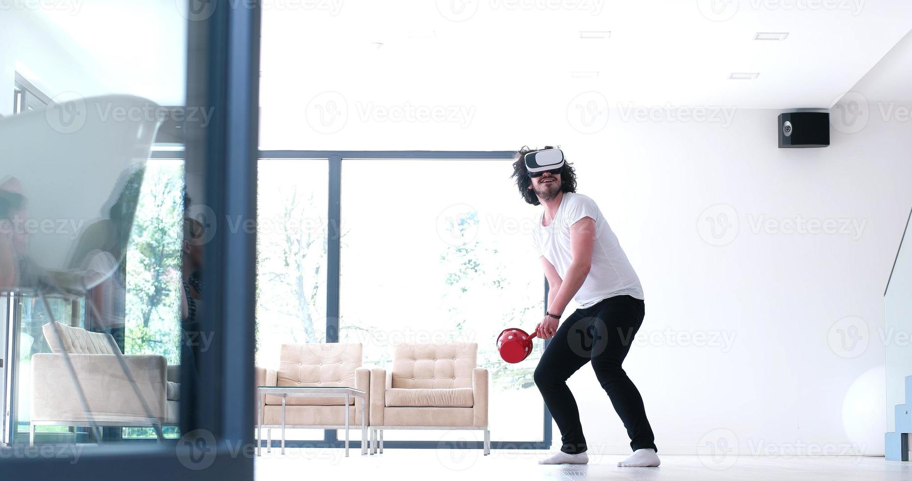 man using VR-headset glasses of virtual reality photo