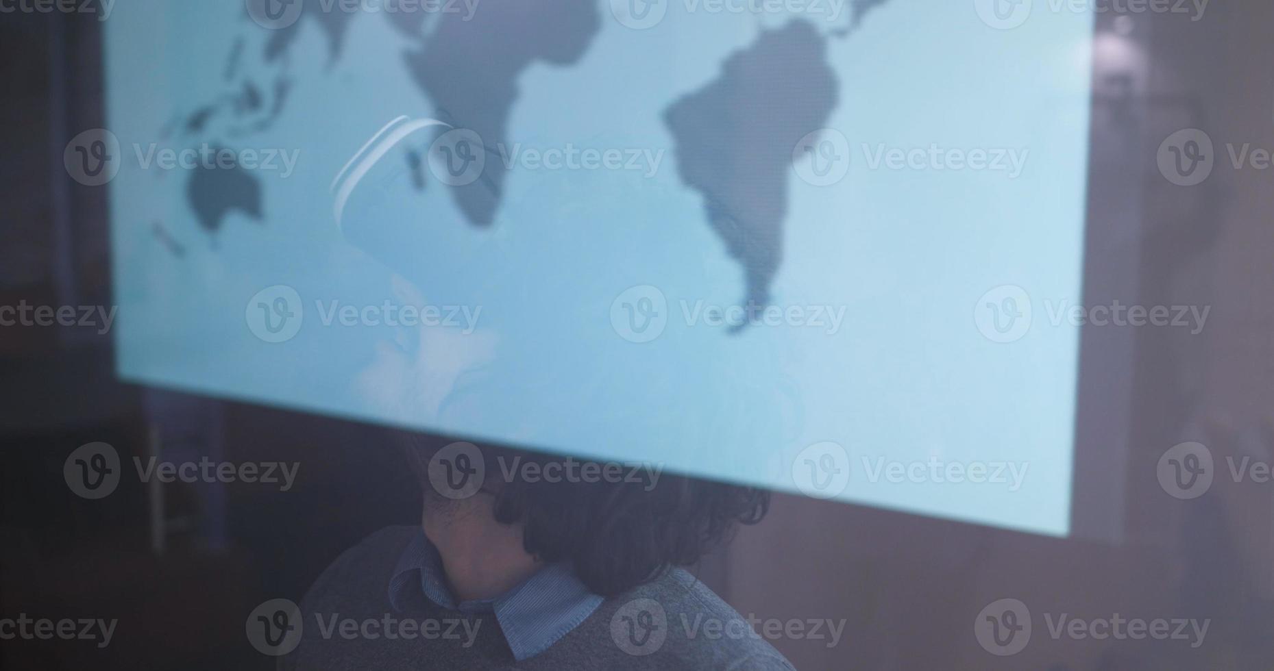 man using VR-headset glasses of virtual reality photo