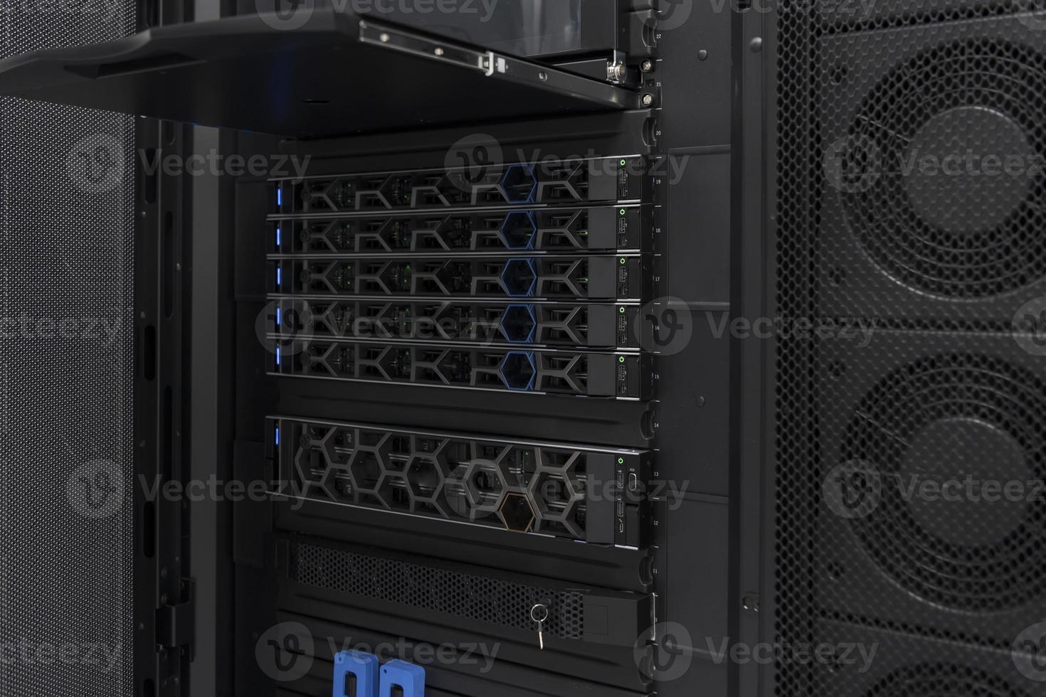 Data Center With Multiple Rows of Fully Operational Server Racks. Modern Telecommunications, Cloud Computing, Artificial Intelligence, Database, Supercomputer Technology Concept. photo
