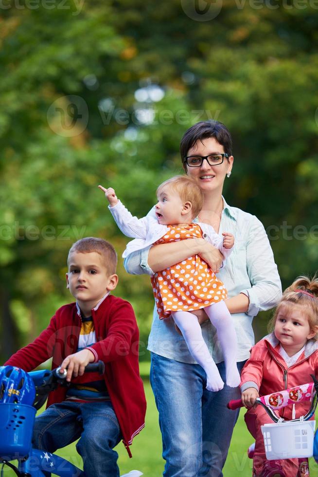 happy young family in park photo