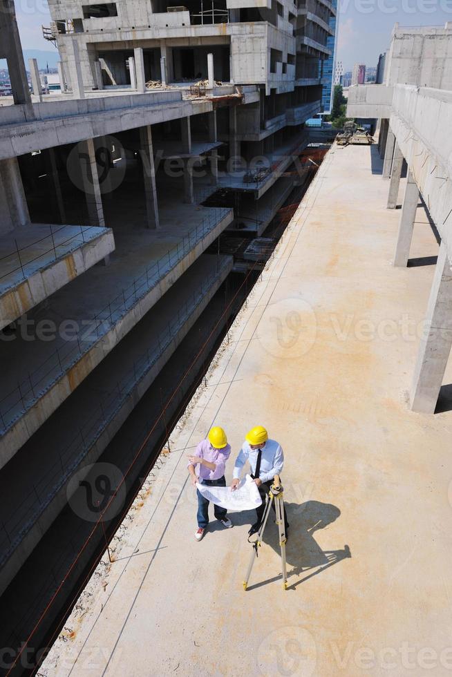 Team of architects on construciton site photo