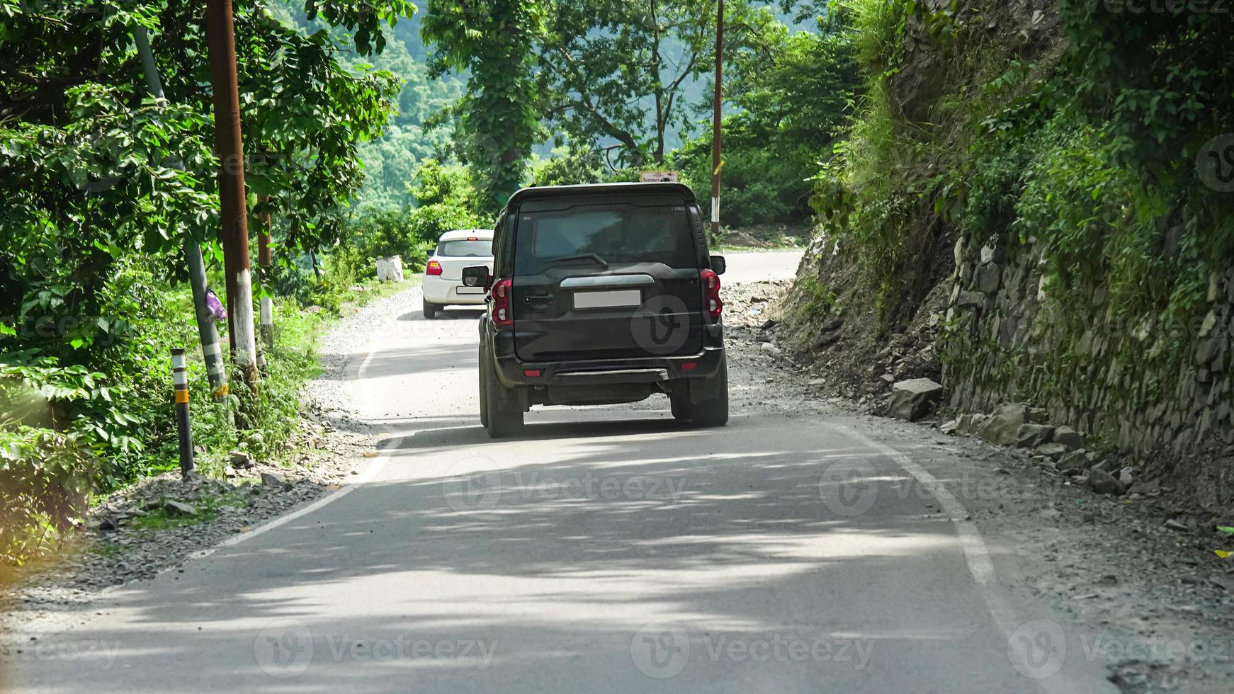 picture of black car on road hd photo