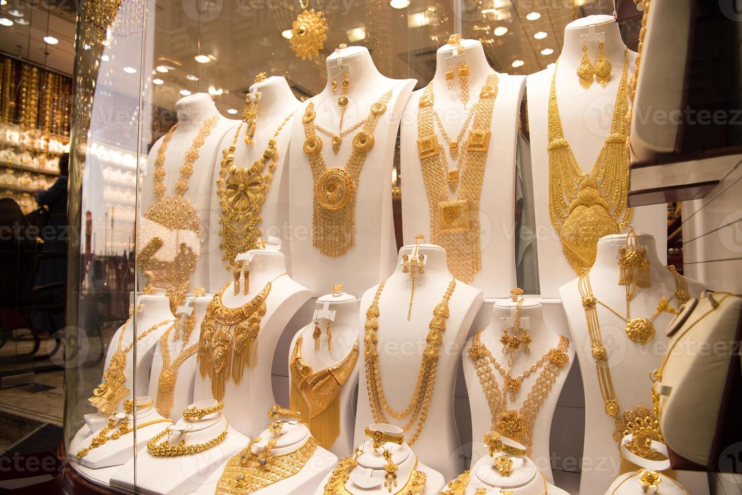 gold jewelry in the shop window photo