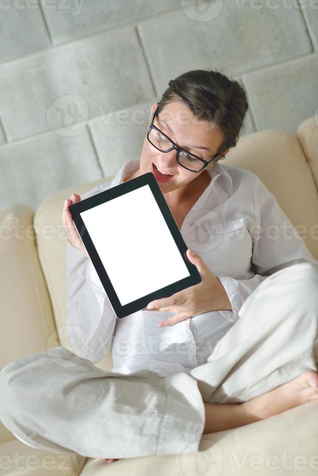 woman using tablet pc at home photo