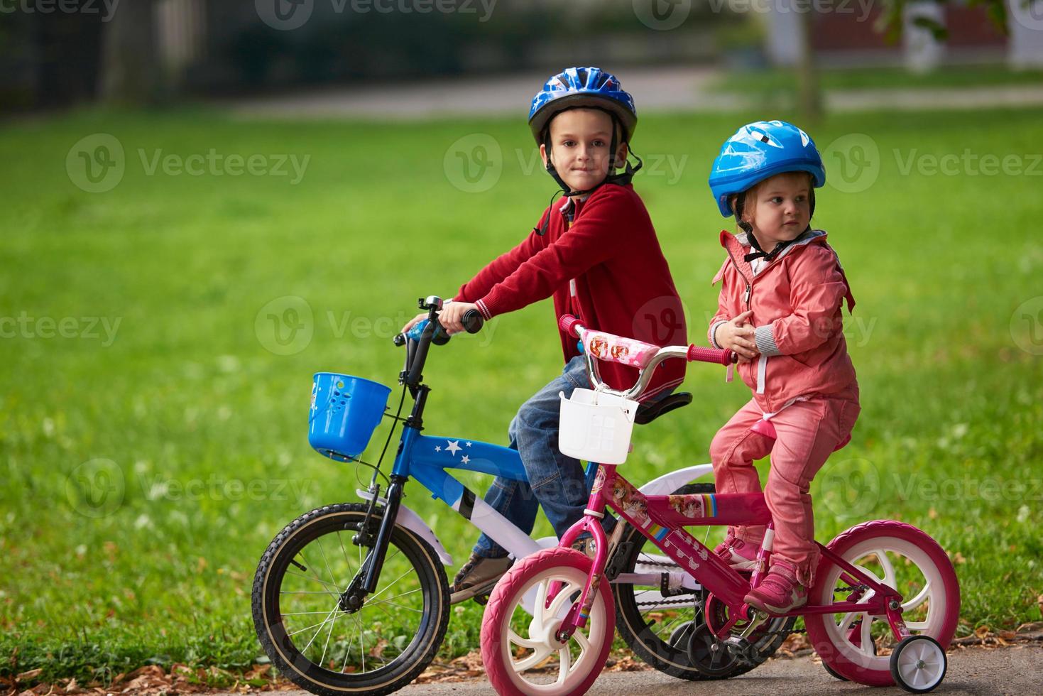 boy and girl with bicycle photo