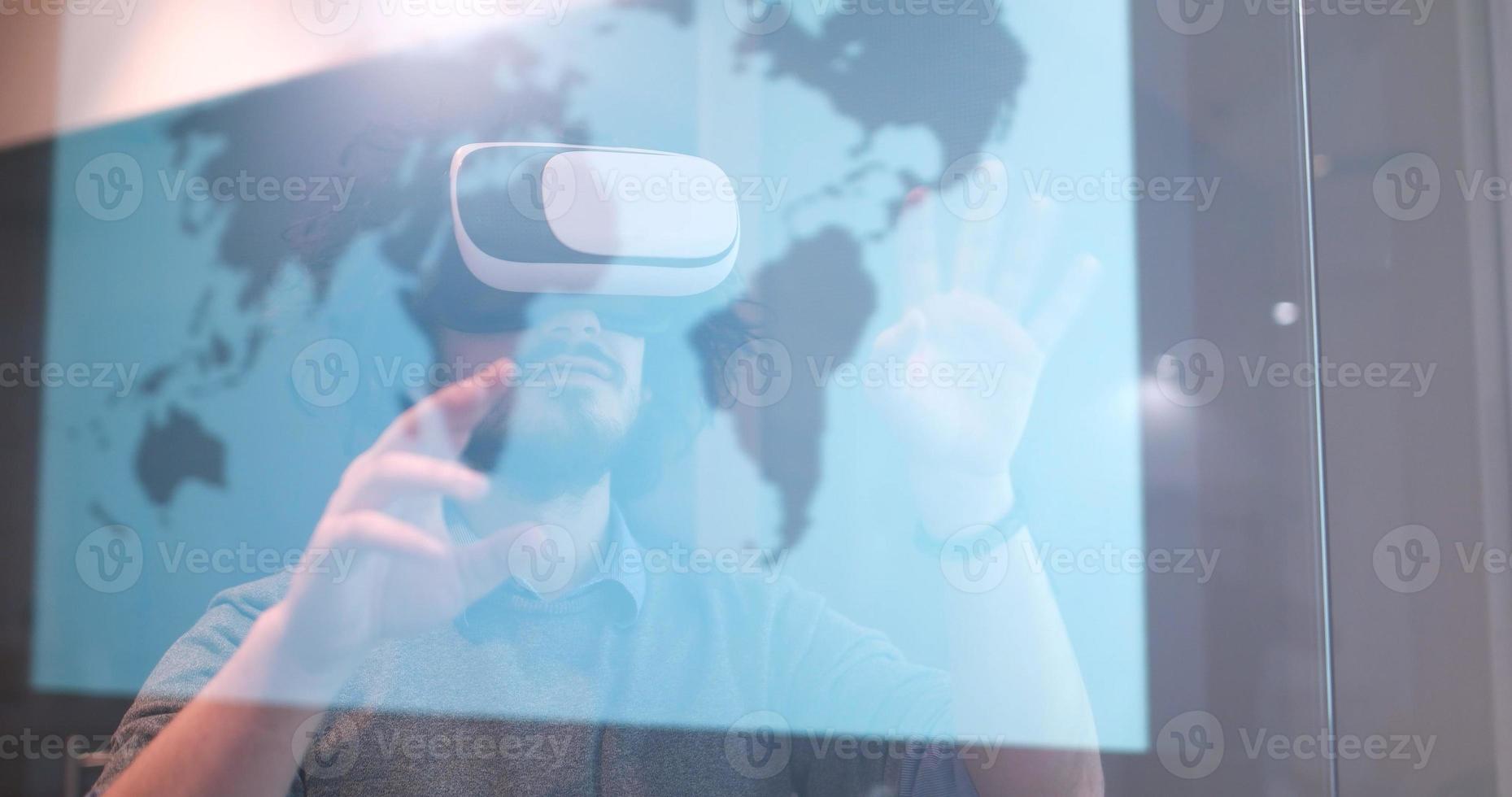 man using VR-headset glasses of virtual reality photo