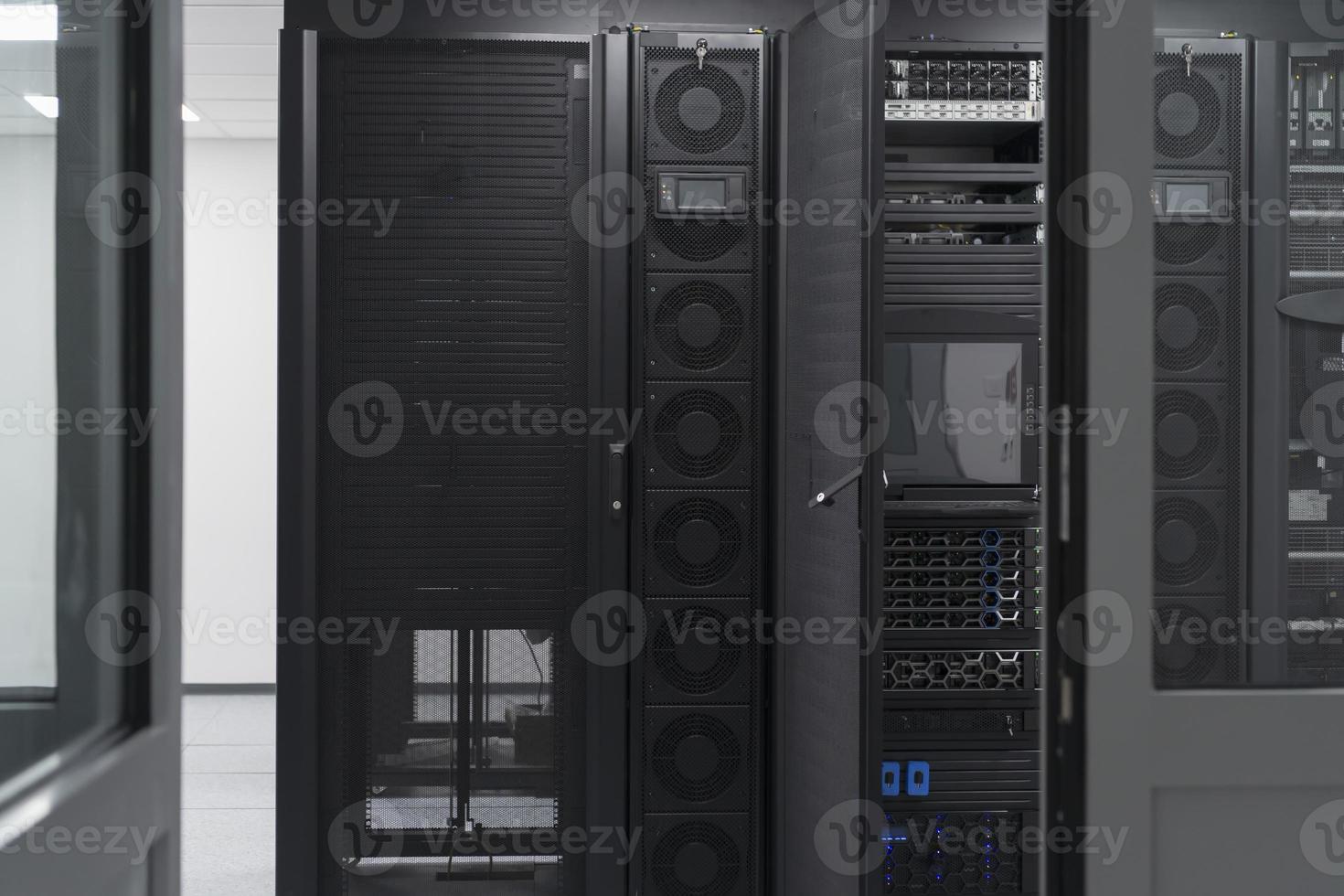 Data Center With Multiple Rows of Fully Operational Server Racks. Modern Telecommunications, Cloud Computing, Artificial Intelligence, Database, Supercomputer Technology Concept. photo