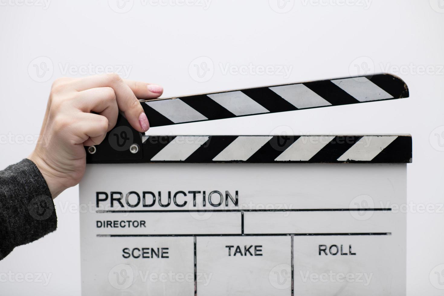 movie clapper on white background photo