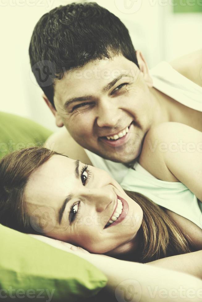 young couple in bed photo