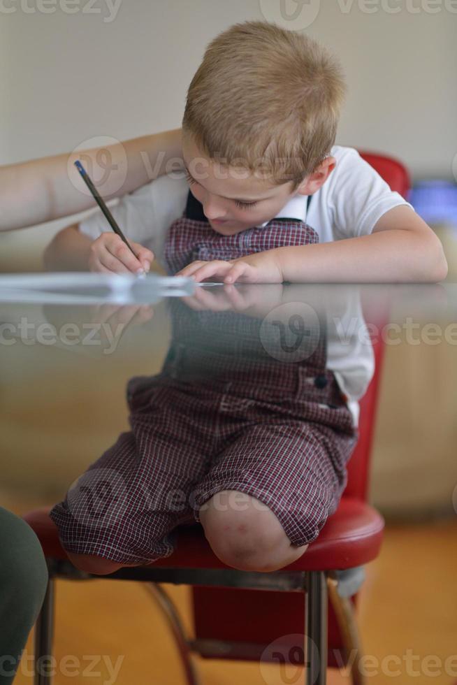 Boy doing homework photo